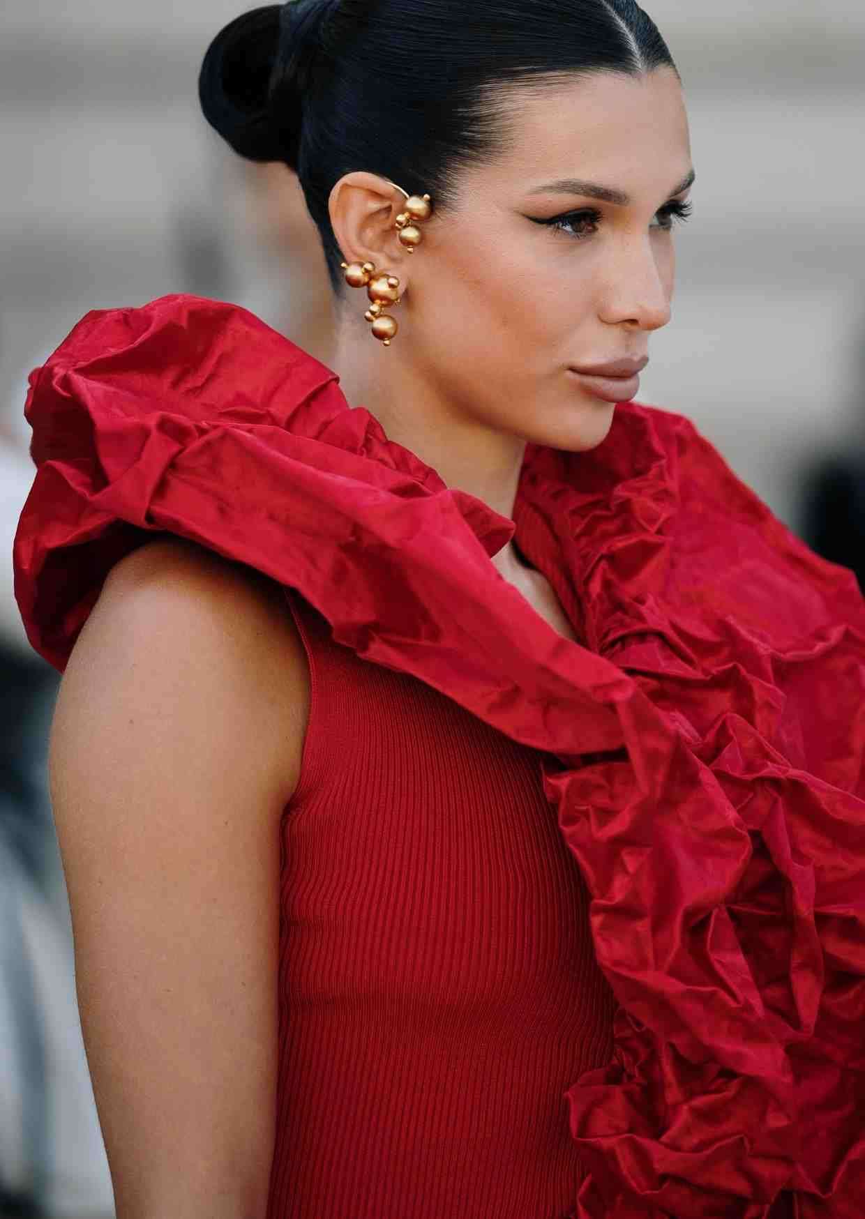 Woman wearing elegant luxury earrings